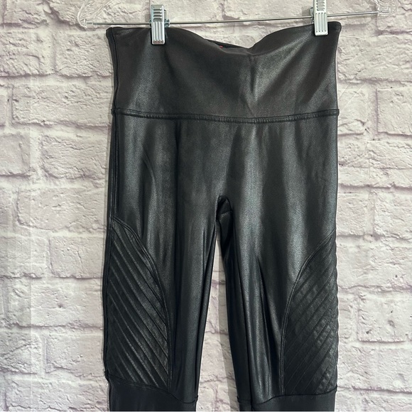 This is a pair of black Spanx Faux Leather Moto Leggings. - Picture 14 of 16